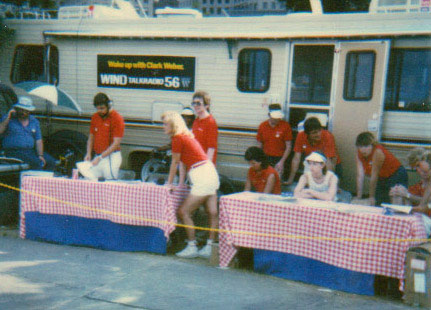 S&J broadcasting from the WIND trailer at Oak St. Beach. Steve doing his best not to look at Johnnie's white shorts. Johnnie doing her best to look casual.